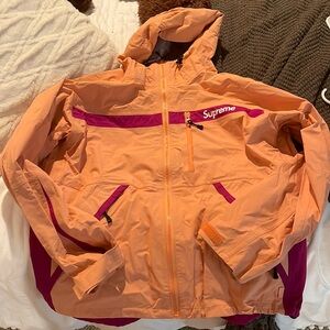 supreme rain coat
